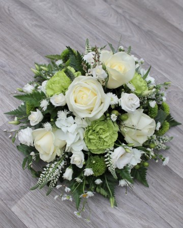 green and white posy display - funeral tribute posy design - white roses - lisianthus september - veronica - green carnation - hypericum - kermit xanth