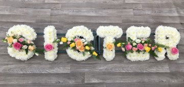 sister funeral tribute display