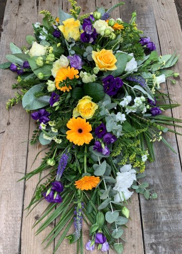 yellow and purple single ended spray - funeral tribute - germini - lisianthus - roses 