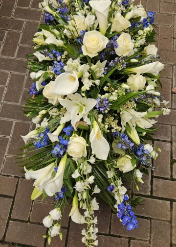 white with blue touches - casket spray - funeral tribute
