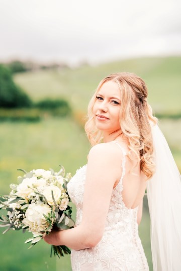 ivory and white wedding flowers - ivory avalanche roses - lisianthus - hydrangea - bridal bouquet - wedding at Wooten Park Wedding Venue 