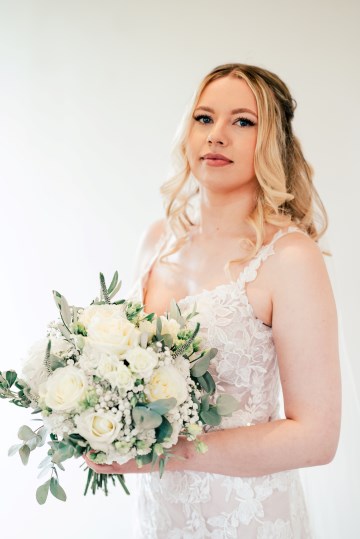 ivory and white wedding flowers - ivory avalanche roses - lisianthus - hydrangea - bridal bouquet - wedding at Wooten Park Wedding Venue 