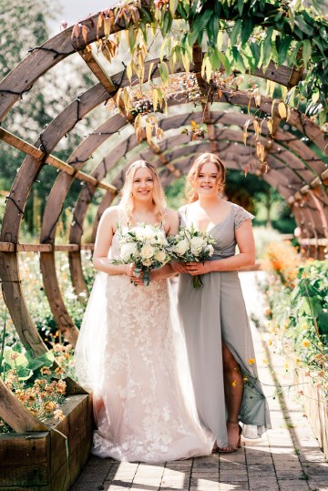 ivory and white wedding flowers - ivory avalanche roses - lisianthus - hydrangea - bridal bouquet - wedding at Wooten Park Wedding Venue 