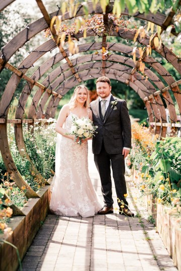 ivory and white wedding flowers - ivory avalanche roses - lisianthus - hydrangea - bridal bouquet - wedding at Wooten Park Wedding Venue 