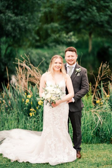 ivory and white wedding flowers - ivory avalanche roses - lisianthus - hydrangea - bridal bouquet - wedding at Wooten Park Wedding Venue - bride and groom flowers