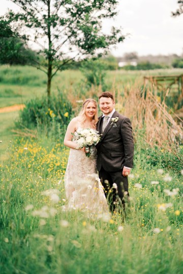 ivory and white wedding flowers - ivory avalanche roses - lisianthus - hydrangea - bridal bouquet - wedding at Wooten Park Wedding Venue - bride and groom flowers