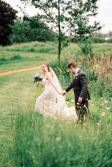 ivory and white wedding flowers - ivory avalanche roses - lisianthus - hydrangea - bridal bouquet - wedding at Wooten Park Wedding Venue - bride and groom flowers