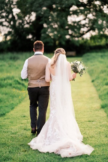 ivory and white wedding flowers - ivory avalanche roses - lisianthus - hydrangea - bridal bouquet - wedding at Wooten Park Wedding Venue - bride and groom flowers