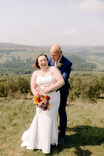 colourful bridal bouquet - summer wedding flowers - ranunculus - peony - english garden rose - cornflowers - agapanthus - wild flowers bridal bouquet