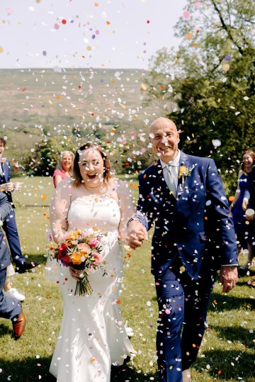 colourful bridal bouquet - summer wedding flowers - ranunculus - peony - english garden rose - cornflowers - agapanthus - wild flowers bridal bouquet