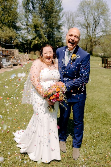 colourful bridal bouquet - summer wedding flowers - ranunculus - peony - english garden rose - cornflowers - agapanthus - wild flowers bridal bouquet