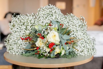 christmas wedding in solihull - festive wedding flowers - ivory and ruby wedding flowers - bridal bouquet - gypsophilla bridesmaids bouquets