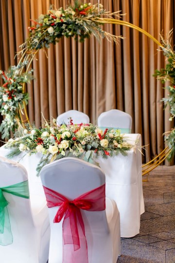 christmas wedding in solihull - festive wedding flowers - ivory and ruby wedding flowers - moongate flowers - ceremony flowers 