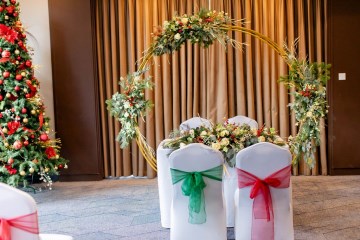 christmas wedding in solihull - festive wedding flowers - ivory and ruby wedding flowers - moongate flowers - ceremony flowers 