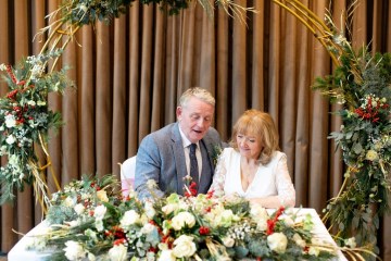 christmas wedding in solihull - festive wedding flowers - ivory and ruby wedding flowers - bridal bouquet - gypsophilla bridesmaids bouquets- moongate flowers - ceremony flowers - registrar table flowers 