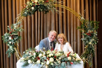 christmas wedding in solihull - festive wedding flowers - ivory and ruby wedding flowers - bridal bouquet - gypsophilla bridesmaids bouquets- moongate flowers - ceremony flowers - registrar table flowers