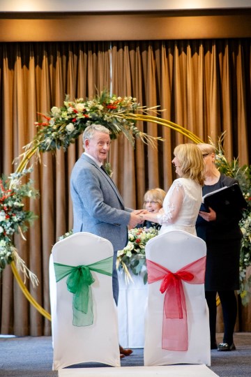 christmas wedding in solihull - festive wedding flowers - ivory and ruby wedding flowers - bridal bouquet - gypsophilla bridesmaids bouquets- moongate flowers - ceremony flowers - registrar table flowers