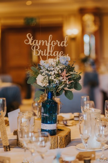 Blush And Blue Bridal Bouquet - blush and blue wedding flowers - sweet avalanche - blue delphinium - blush astilbe - blue eryngium - waxflower - table flowers in blue gin bottles 