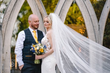 yellow and blue theme wedding at shustoke farm barns - yellow and blue flowers - yellow roses - blue delphiniums - sunflowers - blue thistle - buttonholes - bridesmaids bouquets 