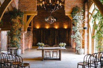 yellow and blue theme wedding at shustoke farm barns - yellow and blue flowers - yellow roses - blue delphiniums - sunflowers - blue thistle - buttonholes - bridesmaids bouquets