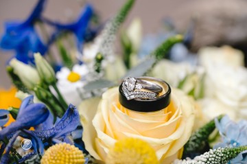 yellow and blue theme wedding at shustoke farm barns - yellow and blue flowers - yellow roses - blue delphiniums - sunflowers - blue thistle - buttonholes - bridesmaids bouquets