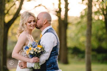 yellow and blue theme wedding at shustoke farm barns - yellow and blue flowers - yellow roses - blue delphiniums - sunflowers - blue thistle - buttonholes - bridesmaids bouquets