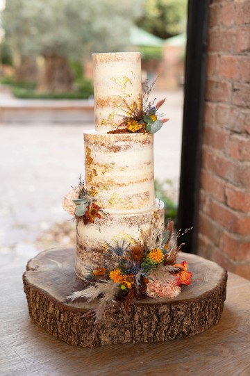 wedding cake flowers - autumnal wedding flowers - shustoke farm barns wedding coleshill