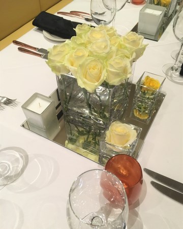 White Rose Cube Vase Display At Andrew Waters Resorts World 