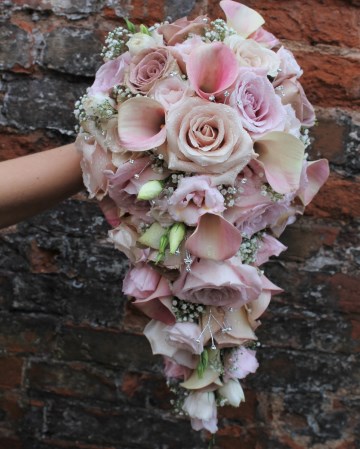 Teardrop Bridal Design Featuring "Amnesia" "Faitht" "Quicksand" Roses- Calla Lilly - Lisianthus - Gypsophila - and Diamante Embellishments 
