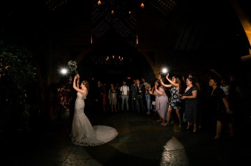 Throwing The Bouquet - Shustoke Farm Barns Wedding 