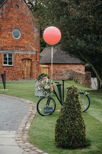 Vintage Bicycle - basket of flowers- shustoke farm barns - entrance styling - welcome board