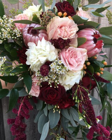 bridal bouquet - blush - marsala -ivory flowers - blush rose - pink king protea - amaranthus - hydrangea - waxflower 