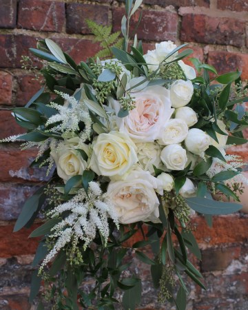 bridal bouquet - wild shower design - white o'hara rose - ivory avalanche rose - ivory astilbe - ivory spray rose - berried eucalyptus - soft ruscuss - bracken fern 