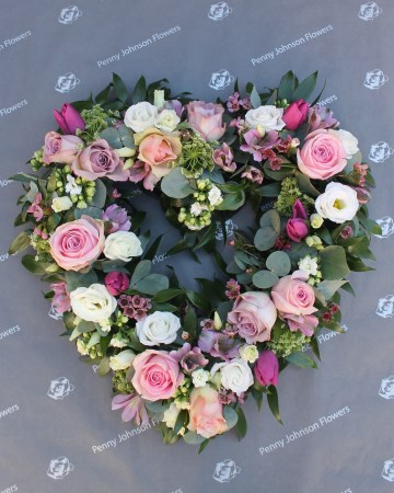 Open heart floral tribute - pink and lilac mix flowers 
