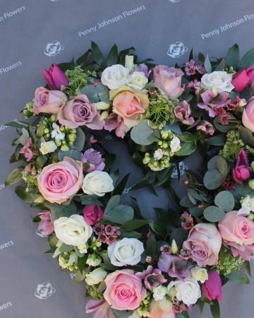 Open heart floral tribute - pink and lilac  mix flowers 