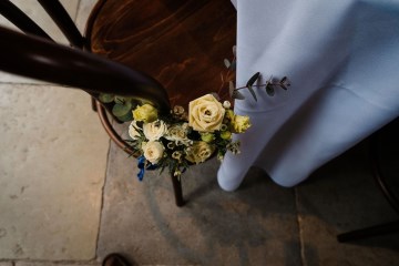 chair decorations to line aisle of ceremony- lemon and yellow flowers 