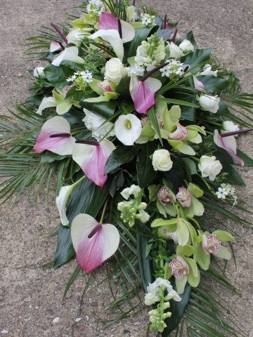 Casket Spray featuring Anthuriums, wjite Rose, Calla Lily, Orchids, Ornithaglum and Hydrangea