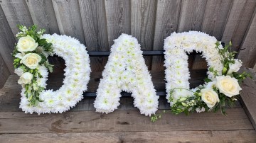DAD funeral tribute - based in white chrysanth with white rose and freesia sprays 