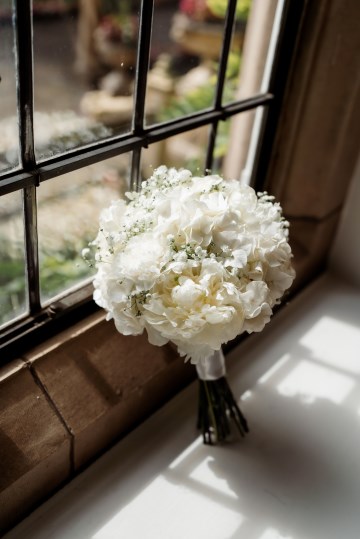 bridal bouquet - round hand tied design featuring Hydrangea, Avalanche Rose and Peony  - at Moxhull Hall wedding Venue